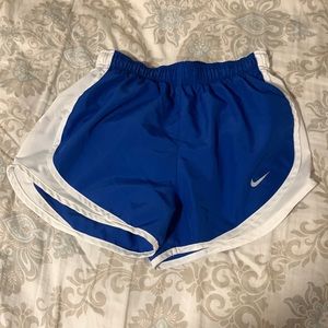 Blue Nike shorts.